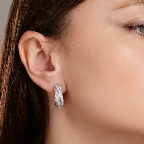 Cartier Trinity - Boucles d'oreilles créoles en or blanc et diamants 58 Facettes 310