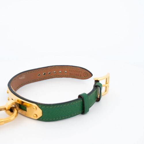 Hermès Kelly - Montre en acier plaqué or, cadran ivoire 58 Facettes 563