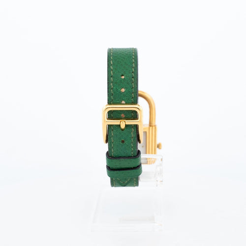 Hermès Kelly - Montre en acier plaqué or, cadran ivoire 58 Facettes 563