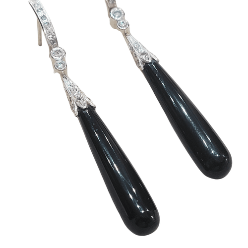 Boucles d'oreilles en or blanc, diamants et onyx 58 Facettes T121