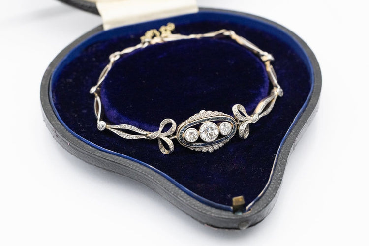 Bracelet ancien en or et platine, diamants et saphirs synthétiques 58 Facettes 13497