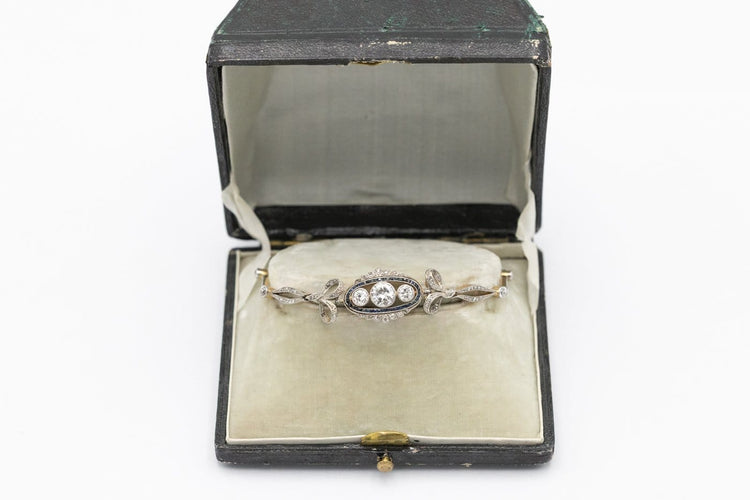 Bracelet ancien en or et platine, diamants et saphirs synthétiques 58 Facettes 13497