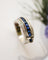 Bague 54 Guy Laroche - Bague bandeau « Ceinture » en or blanc 750, saphirs et diamants 58 Facettes C2259