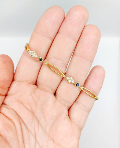 Bracelet vintage en or 18k, diamants et saphirs 58 Facettes A07641