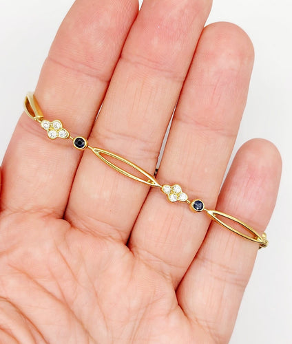Bracelet vintage en or 18k, diamants et saphirs 58 Facettes A07641