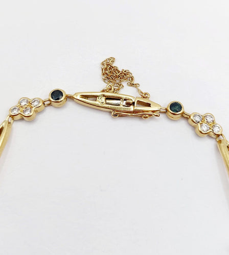 Bracelet vintage en or 18k, diamants et saphirs 58 Facettes A07641