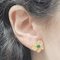 Boucles d'oreilles fleurs en or 18k, nacre et émeraudes 58 Facettes TA29PI688