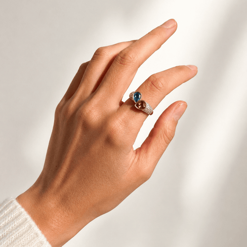 https://cdn.shopify.com/s/files/1/0943/8576/6747/files/bague-joaillerie-vintage-citrine-aigue-marine-diamants-1980.png?v=1779364737