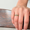 55 Demi-alliance - Bague en or jaune 18 carats et émeraudes 58 Facettes