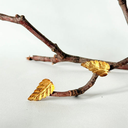 Boucles d’oreilles feuille en or jaune 58 Facettes