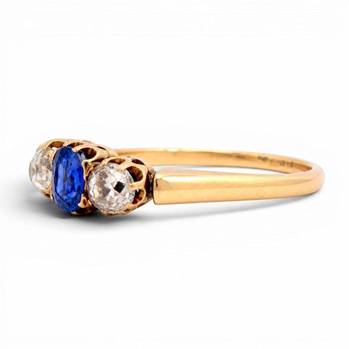 https://cdn.shopify.com/s/files/1/1015/8633/8124/files/antique-victorian-14k-gold-sapphire-diamond-trilogy-ring-stone-detail.jpg?v=1784917236