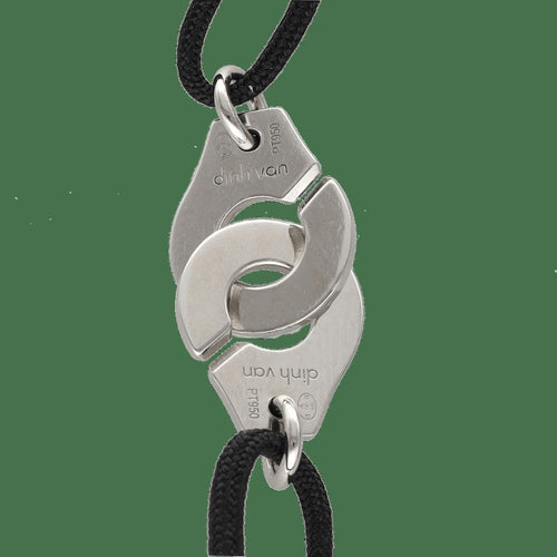 Dinh Van Menottes - Bracelet moyen modèle en platine 58 Facettes FB11701