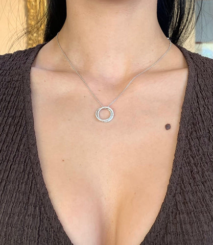 Collier Collier double cercle pavé de diamants en or gris 18 carats 58 Facettes C83