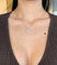 Collier Collier double cercle pavé de diamants en or gris 18 carats 58 Facettes C83