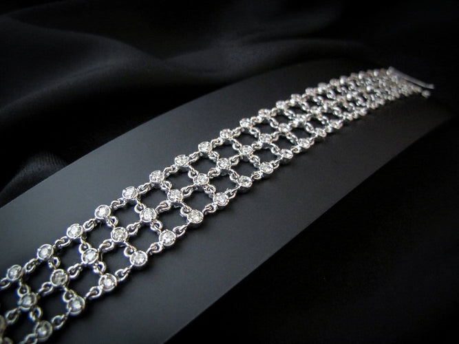 Bracelet en or blanc 18K et diamants 58 Facettes BRA 4131