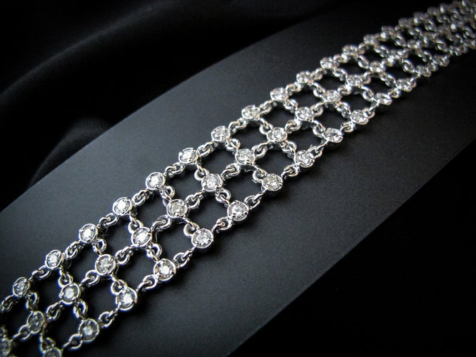 Bracelet en or blanc 18K et diamants 58 Facettes BRA 4131