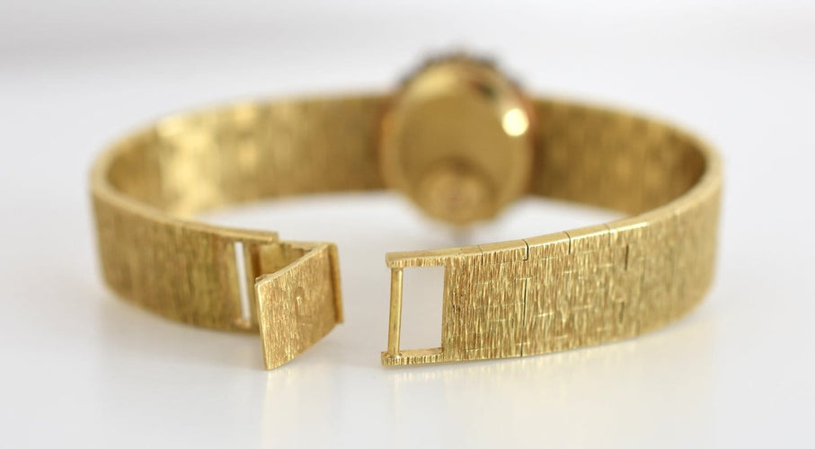 Piaget Haute Joaillerie - Montre en or jaune 18 carats et diamants 58 Facettes PIA-200