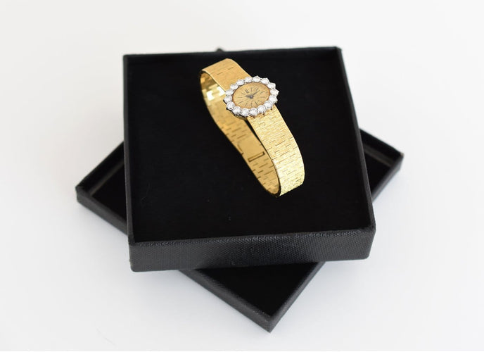 Piaget Haute Joaillerie - Montre en or jaune 18 carats et diamants 58 Facettes PIA-200