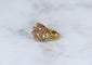 57 Bague boule cordage en or rose, saphirs, rubis et diamants 58 Facettes