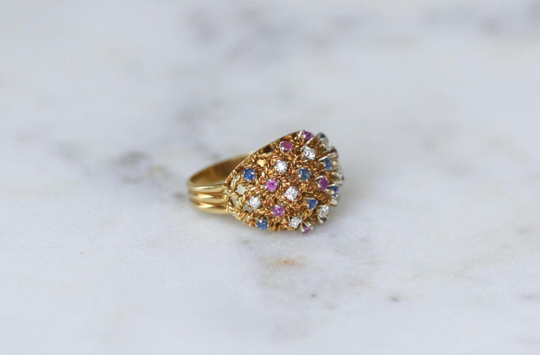 57 Bague boule cordage en or rose, saphirs, rubis et diamants 58 Facettes