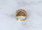 57 Bague boule cordage en or rose, saphirs, rubis et diamants 58 Facettes