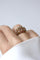 57 Bague boule cordage en or rose, saphirs, rubis et diamants 58 Facettes