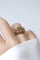 57 Bague boule cordage en or rose, saphirs, rubis et diamants 58 Facettes