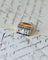53 Tank - Bague en or rose, platine, diamant coussin et saphirs 58 Facettes