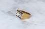 53 Tank - Bague en or rose, platine, diamant coussin et saphirs 58 Facettes