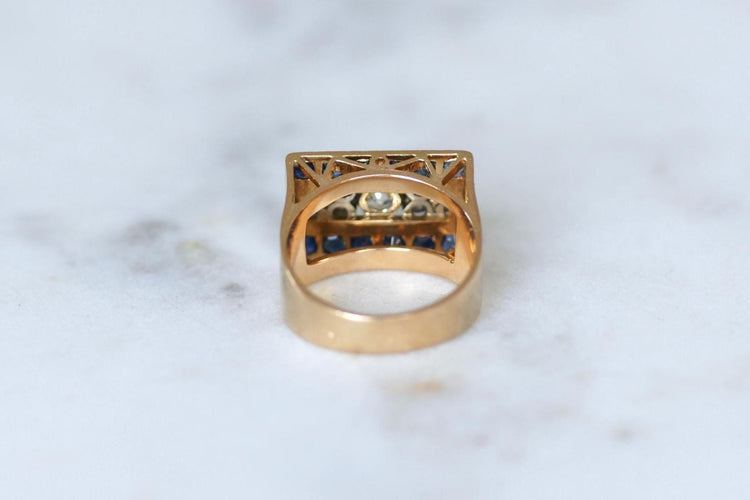 53 Tank - Bague en or rose, platine, diamant coussin et saphirs 58 Facettes
