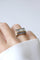 53 Tank - Bague en or rose, platine, diamant coussin et saphirs 58 Facettes