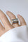 53 Tank - Bague en or rose, platine, diamant coussin et saphirs 58 Facettes