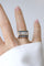 53 Tank - Bague en or rose, platine, diamant coussin et saphirs 58 Facettes