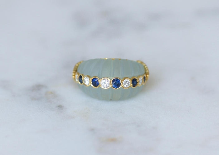 51 Jean & Pierre Bellin - Bague boule en or jaune, aigues-marines, diamants et saphirs 58 Facettes