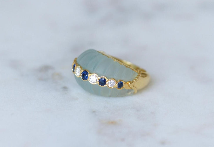 51 Jean & Pierre Bellin - Bague boule en or jaune, aigues-marines, diamants et saphirs 58 Facettes