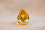 Bague Bague marquise en or jaune 18 carats avec saphir jaune synthétique 58 Facettes 3121