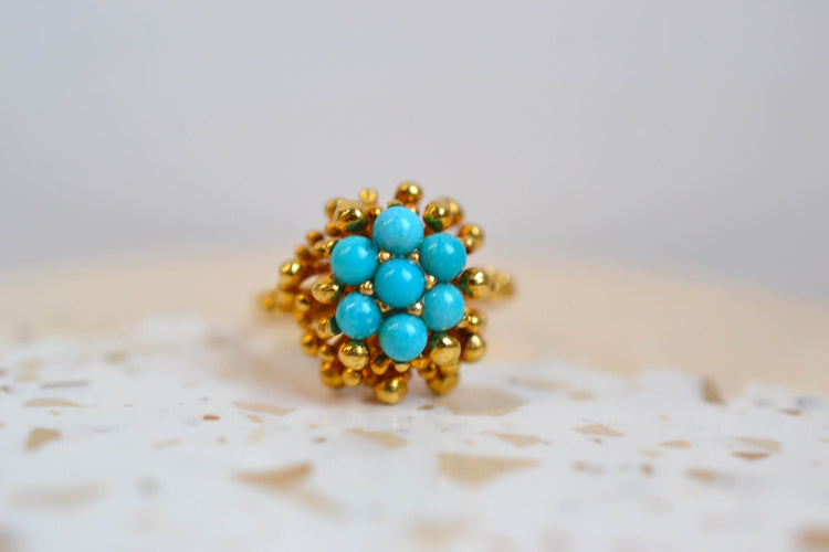 51 Bague fleur en or jaune et turquoises 58 Facettes 3238
