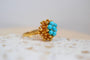 51 Bague fleur en or jaune et turquoises 58 Facettes 3238