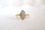 55 Bague navette en or jaune et or blanc avec diamants 58 Facettes 3377