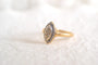 55 Bague navette en or jaune et or blanc avec diamants 58 Facettes 3377