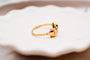 Bague 54 Bague nœud en or jaune 18 carats sertie d’oxyde 58 Facettes 3803