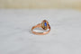 55 Marguerite - Bague en or rose, doublet grenat-verre et diamants 58 Facettes 3655
