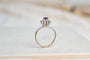 55 Bague Marguerite en or blanc, saphir et diamants 58 Facettes 3789