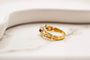 51 Bague Art déco en or jaune, rubis et diamants 58 Facettes 3849