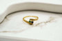 53 Bague Toi et Moi en or jaune avec saphir et émeraude 58 Facettes 3809