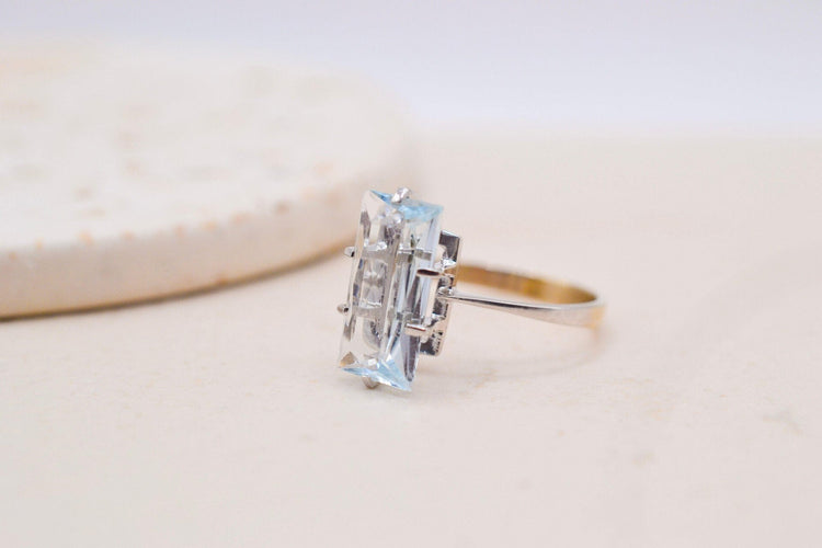 54 Bague en or blanc et jaune avec aigue-marine 58 Facettes 3987