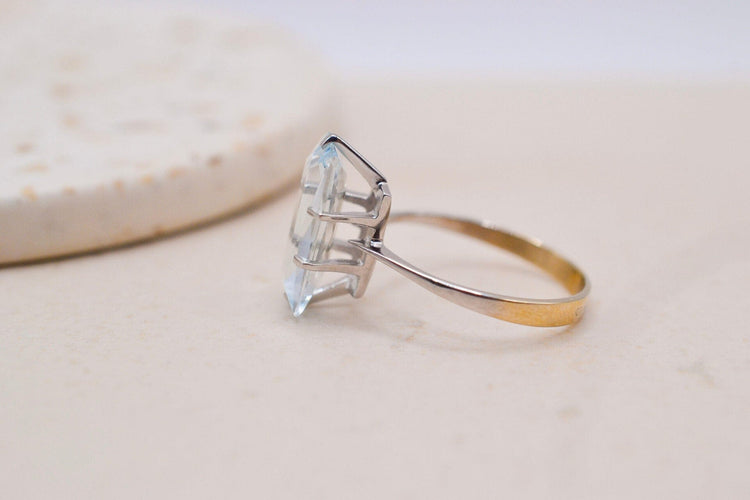 54 Bague en or blanc et jaune avec aigue-marine 58 Facettes 3987