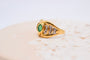 50 Bague nœud en or jaune, émeraude et diamants 58 Facettes 3988