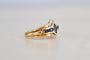 54 Bague navette en or jaune, or blanc, saphirs et diamants 58 Facettes Ref4018