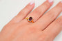 51 Bague solitaire ovale en or jaune et grenat 58 Facettes 4078